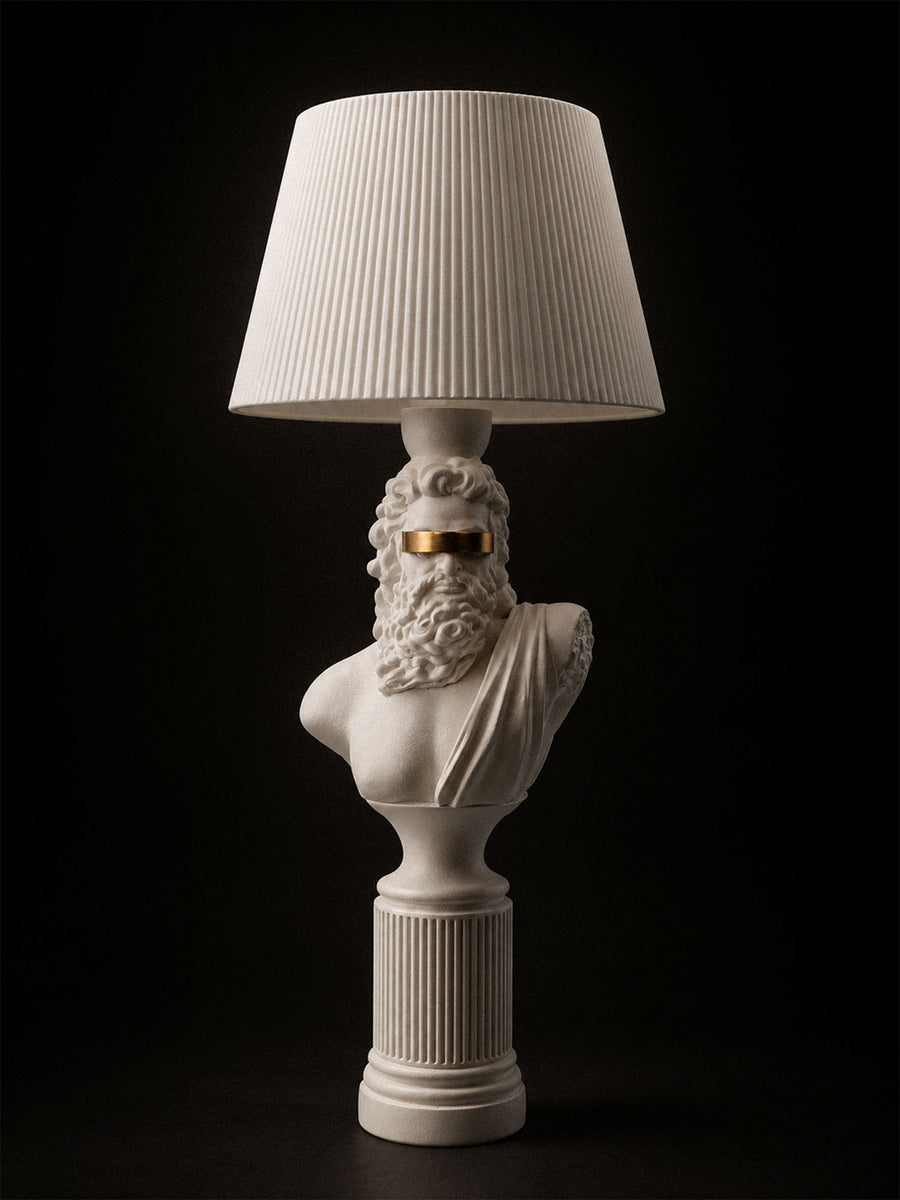 Blind Zeus sculptural lamp with white classical bust and gold blindfold
