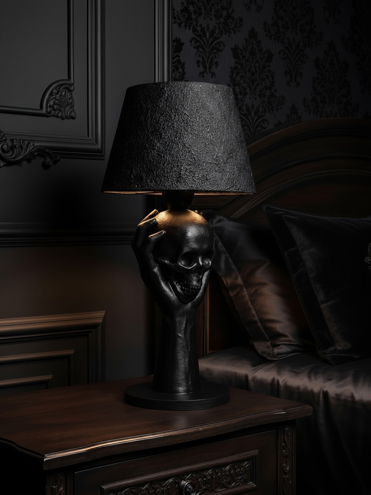 Lifestyle shot of the 'To Be or Not To Be' lamp on a dark wood nightstand in a moody, elegant gothic bedroom.