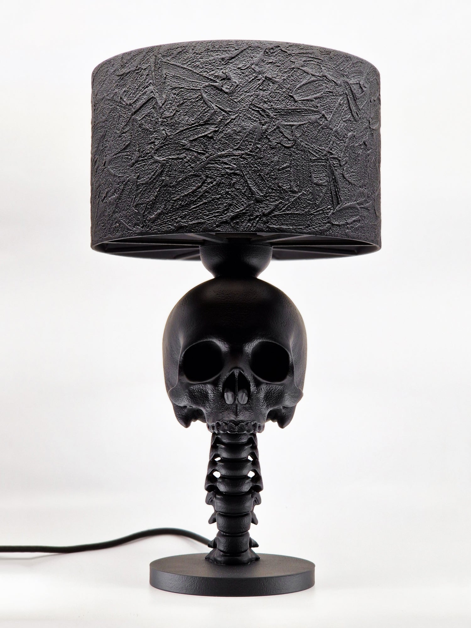 Spine detail of Skull Spine Lamp, highlighting handmade gothic design by Horror Romance.