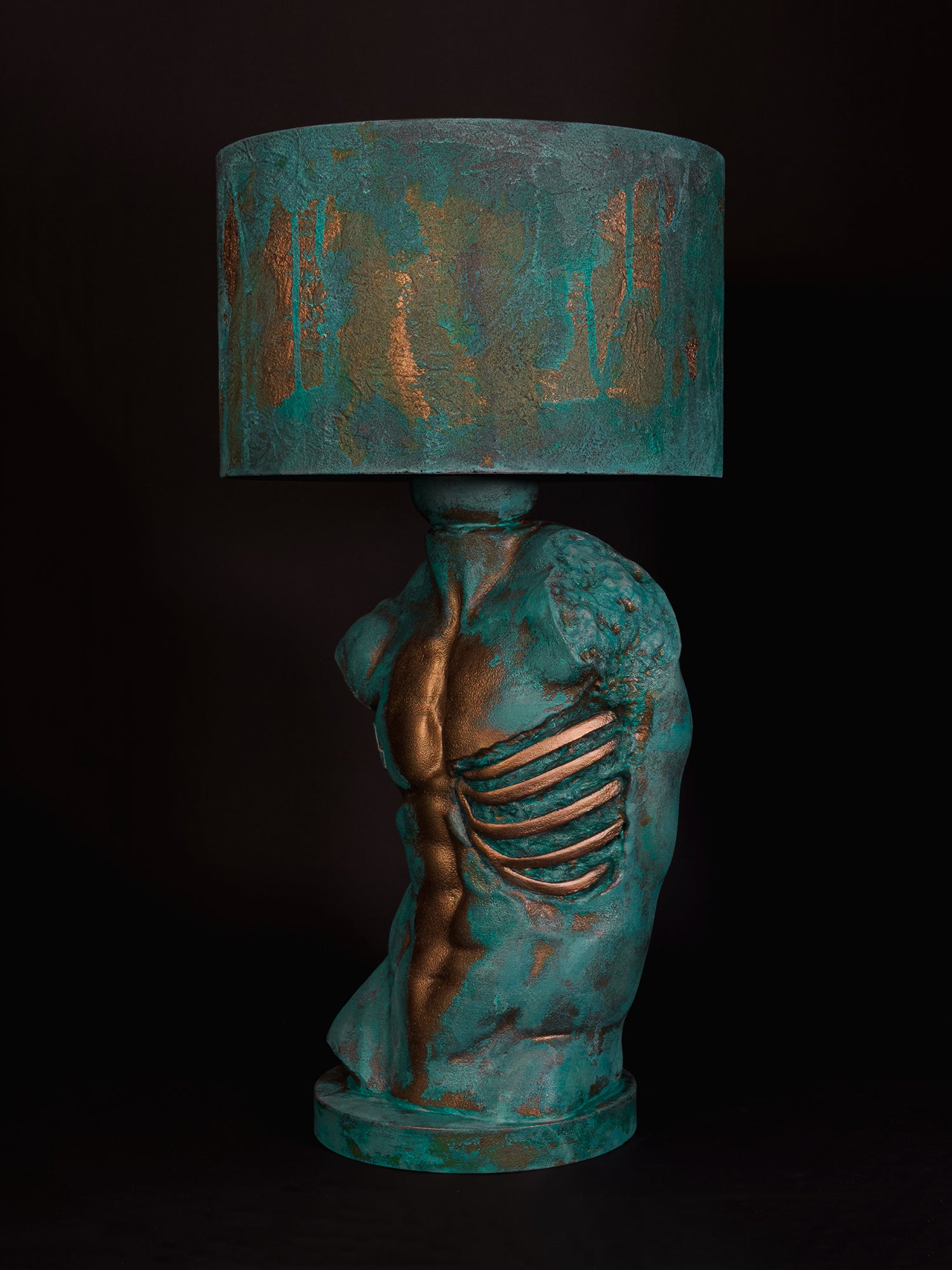 Side view of Verdigris Body Adam showing exposed sculpted ribs and turquoise copper patina