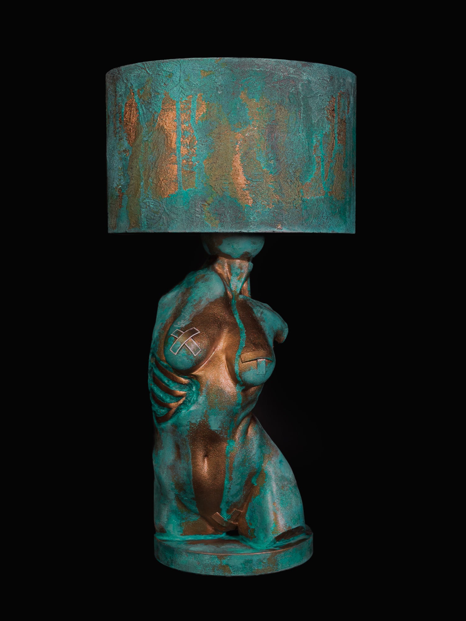 Verdigris Body Eve sculptural lamp with turquoise patina and exposed copper on a female torso and matching shade